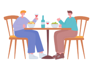 image of two people having dinner at a table and talking